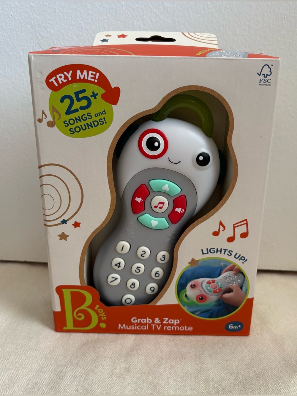 B.Toys Grab & Zap Musical TV Remote – Baby Learning Toy with 25+Songs Sounds 6m+